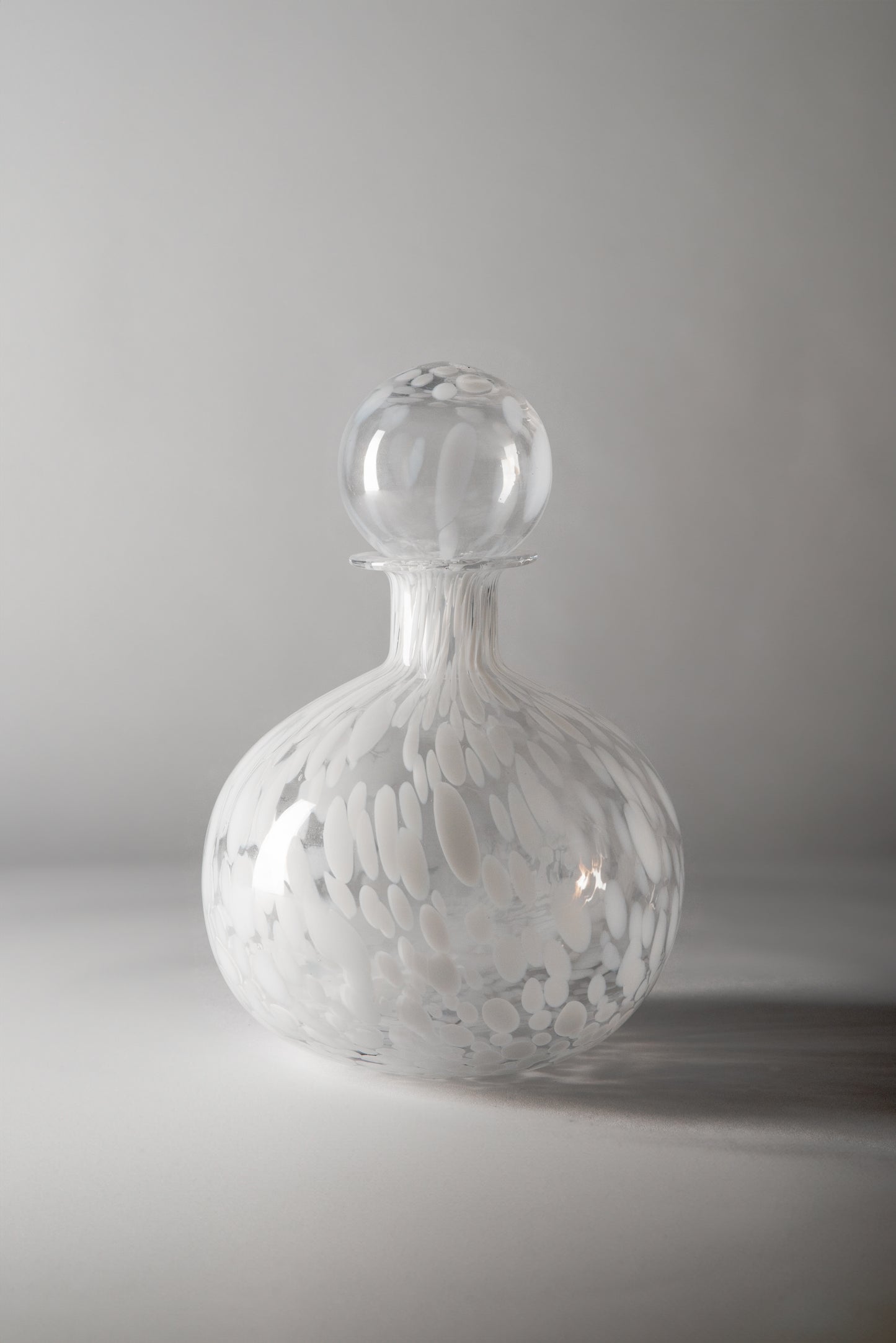 Beige and White Glass Bottles