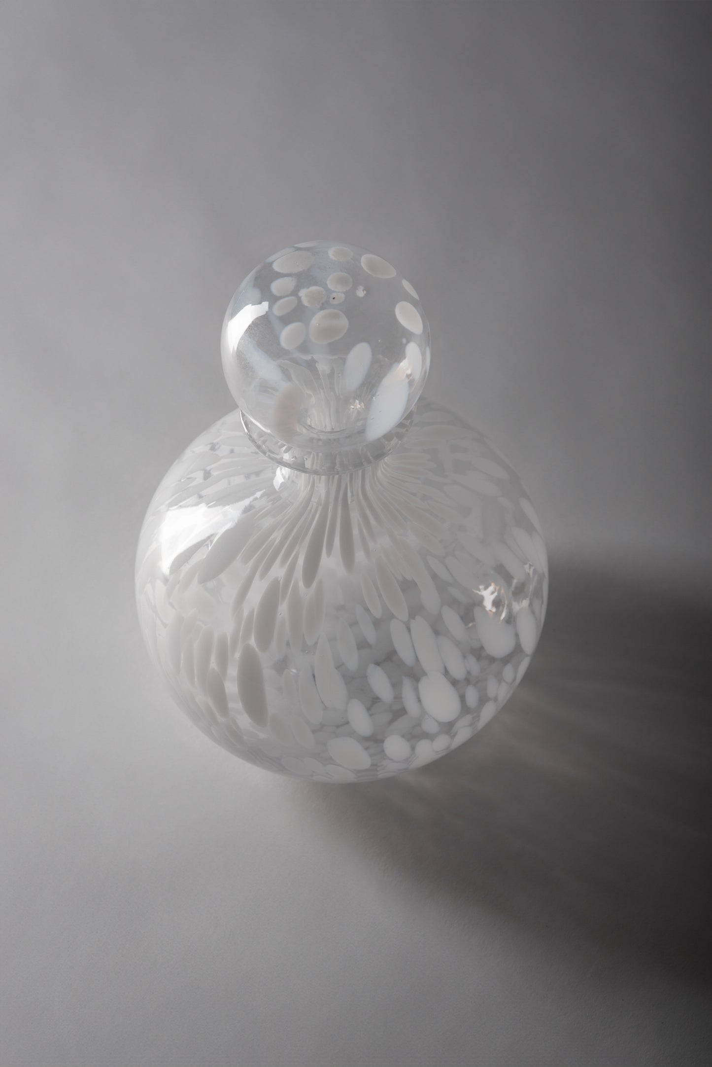 Beige and White Glass Bottles