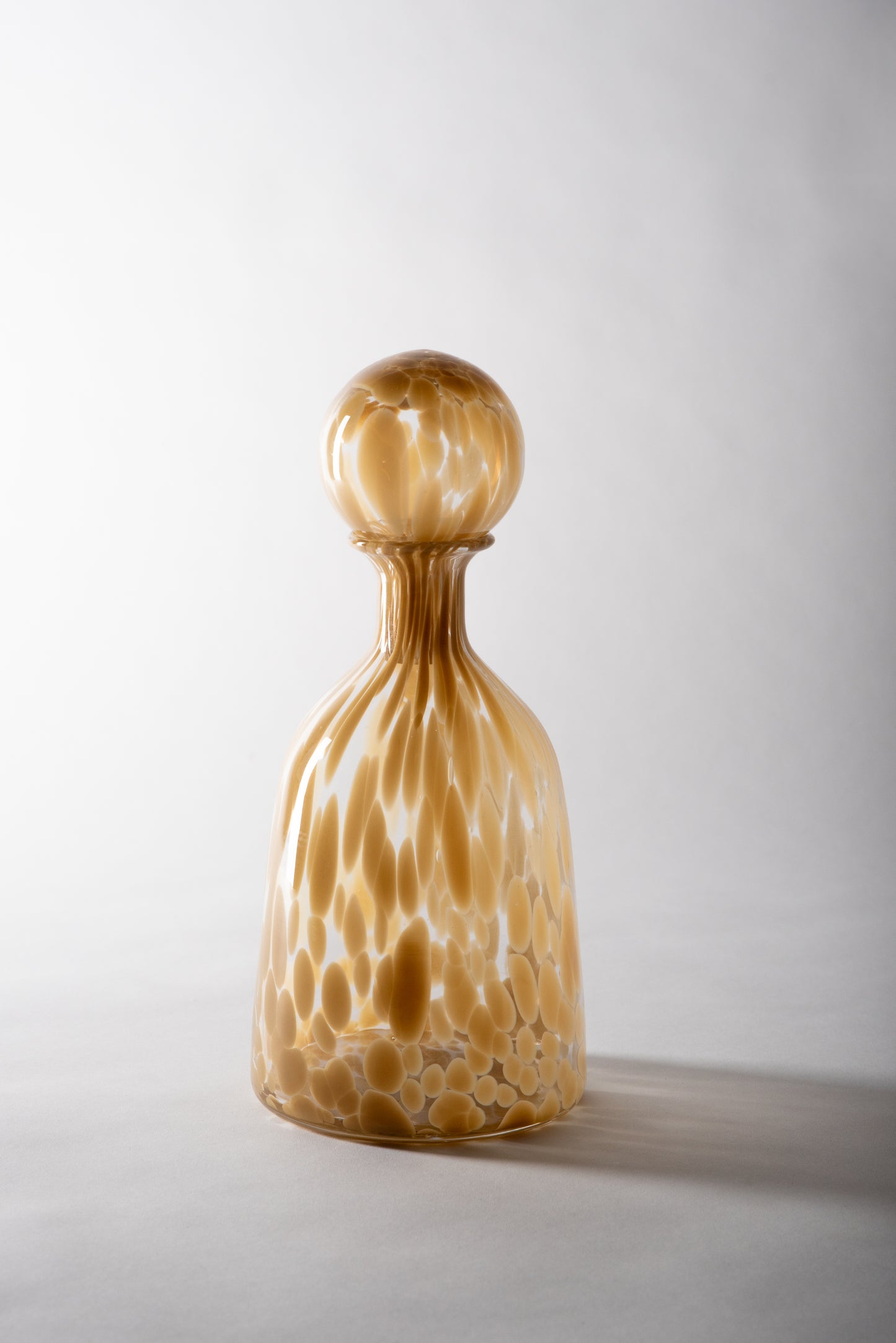 Beige and White Glass Bottles