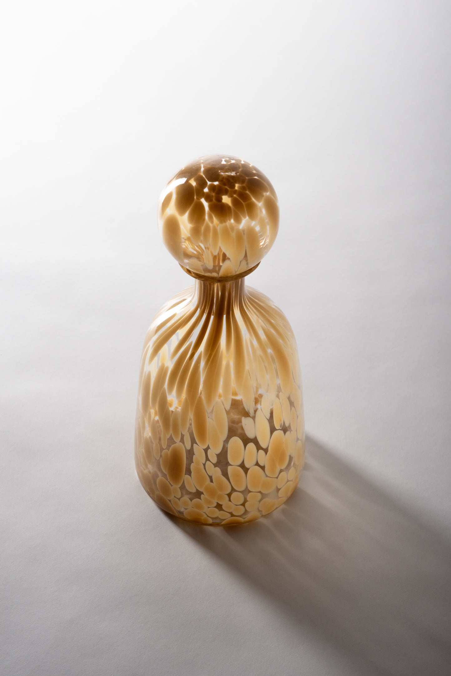 Beige and White Glass Bottles